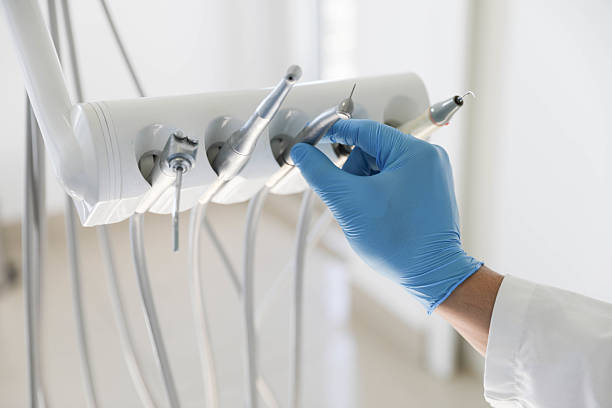 Professional Invisalign Clear Aligners technician working in Holley, FL